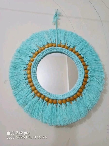 mirror with macrame wall hanging